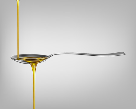Oil poured into a spoonのイラスト素材