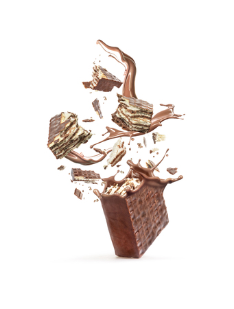 Wafers are broken into pieces, with a chocolate splash isolated on a white backgroundの写真素材
