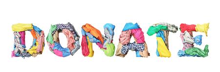 Donate sign made of clothes isolated on white backgroundの写真素材