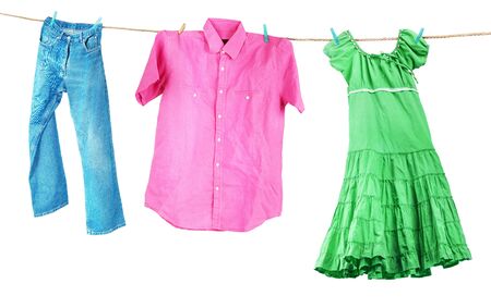 Clothes hanging on a white backgroundの写真素材