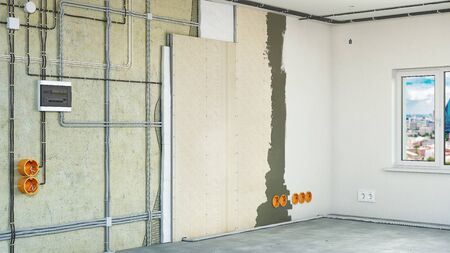 Electrical wiring hidden behind the drywall, 3d illustrationの写真素材