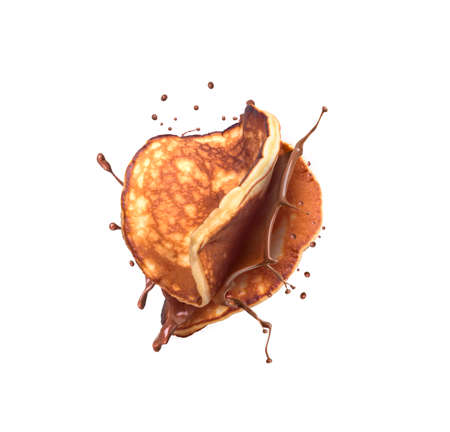 pancakes falling and chocolate splash isolatedの写真素材