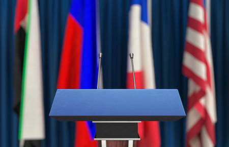 Tribune with microphones and flags on blue background 3d illustrationの写真素材