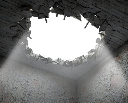 A hole in a ceiling broken on pieces and metal carcass parts, illuminated by the light from outside, 3d illustrationの写真素材