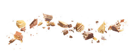 Flow of broken wafers into pieces on a white backgroundの写真素材