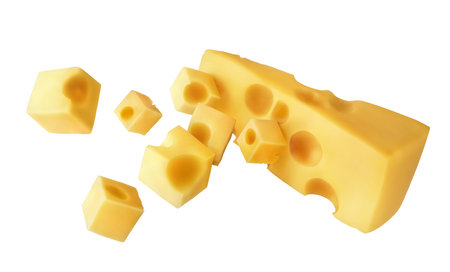 Half of cheese with different pieces of cheese setの写真素材