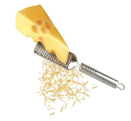 Piece of cheese is rubbed on a hand graterの写真素材