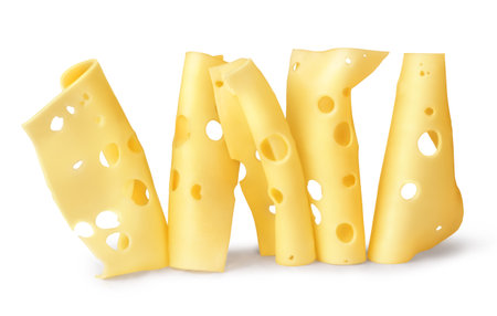 Cheese slices with shadow on white isolated backgroundの写真素材