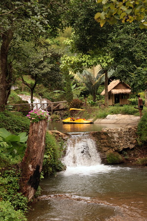 The landscape with a waterfall near the village fishing north of Chiang Mai in northern Thailandのeditorial素材