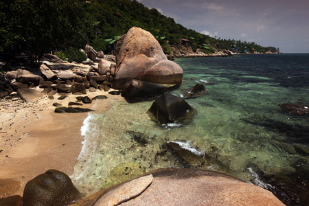The beach at Cape Depending Ta transition Beach on the island of Koh Tao in the Gulf of Thailand in the south west of Thailand in South East Asiaの写真素材
