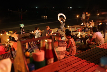 A Feuerkuenstler on the island of Koh Tao in the Gulf of Thailand in the south west of Thailand in South East Asiaのeditorial素材