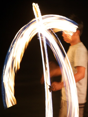 A Feuerkuenstler on the island of Koh Tao in the Gulf of Thailand in the south west of Thailand in South East Asiaのeditorial素材