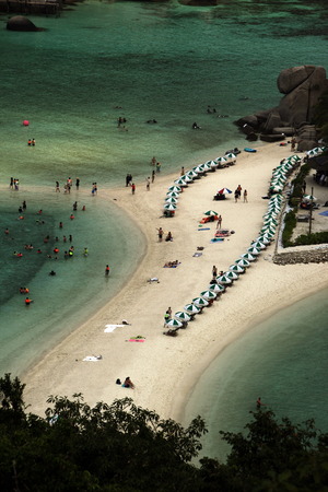 The beach and island scenery on the island of Koh Naang yuan next to the island of Koh Tao in the Gulf of Thailand in the south west of Thailand in South East Asiaのeditorial素材