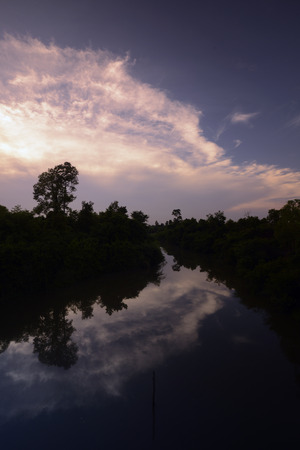 The evening in the province Amnat Charoen north-west of Ubon Ratchathani in the northeast of Thailand in South East Asiaの写真素材