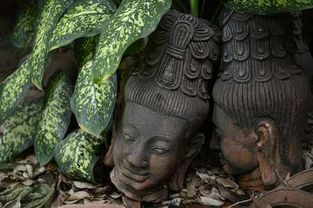 Traditional figures, in the garden of Ban Phor Linag Meuns Terracota type ready for sale in Terracota Garden in Chiang Mai in the north of Thailand in South East Asiaの写真素材