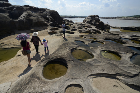 The stone landscape in the Mekong River at the Nature Park Sam Phan Bok at Lakhon Pheng on the Mekong River in the province of Amnat Charoen north-west of Ubon Ratchathani in the northeast of Thailand in South East Asiaのeditorial素材