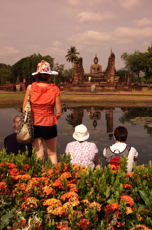 A Buddha statue in Wat Mahathat temple in the temple complex of Old Sukhothai Province Sukhothai in the north of Thailand in South East Asiaのeditorial素材