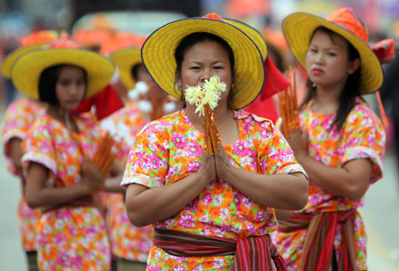 A traditional dance group shows at the festival parade at the Bun Bang Fai Rocket Festival in...