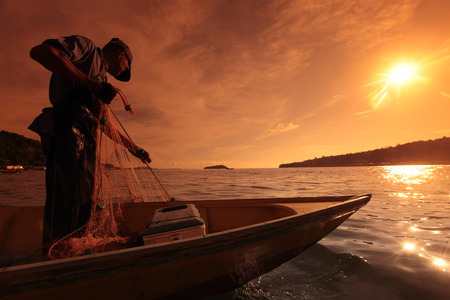 A fisherman in the water landscape around the capital Bandar Seri Begawan in Brunei Darussalam Kingdom on Borneo in South East Asiaのeditorial素材