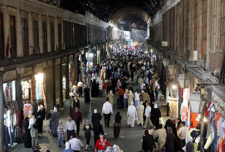 An alley with shops in the souq in the old city of the Syrian capital of Damascusのeditorial素材