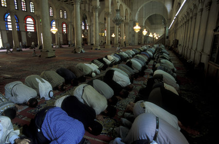 Muslims when praying in the Umayyad Mosque in Damascus, capital of Syria in the Middle East in Arabiaのeditorial素材