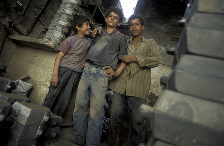 Young workers in the Souq or market in the medina of the old city of Aleppo in northern Syria in the Middle Eastのeditorial素材