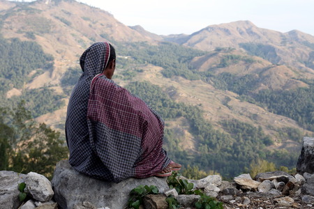 A farmer in a farming village in the mountain village of Maubisse south of Dili in East Timor on the island of Timor separated into two in Asiaのeditorial素材