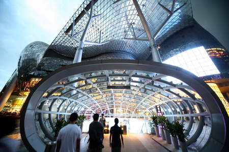 The entrance to the ION Orchard shopping center on Orchard Road in Singapore in the island state of Singapore in Asiaのeditorial素材