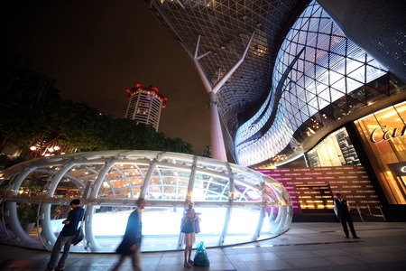 The entrance to the ION Orchard shopping center on Orchard Road in Singapore in the island state of Singapore in Asiaのeditorial素材