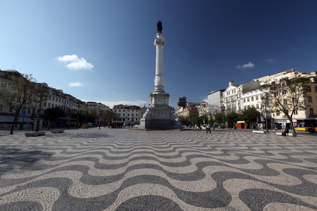 Rossio Square with the National Theatre in the historic center of Lisbon in Portugalのeditorial素材