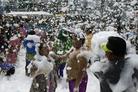The Songkran festival or Thai New Year water festival to is in full swing north of Bangkok in Ayutthaya Thailand in Southeast Asiaのeditorial素材