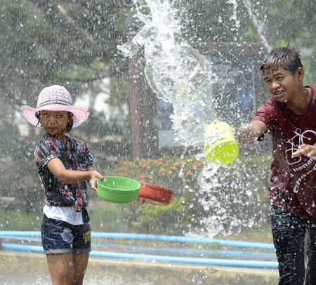 The Songkran festival or Thai New Year water festival to be in full swing north of Bangkok in Ayutthaya Thailand in Southeast Asiaのeditorial素材
