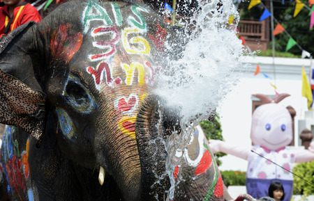 The Songkran festival or Thai New Year water festival to is in full swing north of Bangkok in Ayutthaya Thailand in Southeast Asiaのeditorial素材