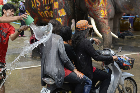 The Songkran festival or Thai New Year water festival to is in full swing north of Bangkok in Ayutthaya Thailand in Southeast Asiaのeditorial素材