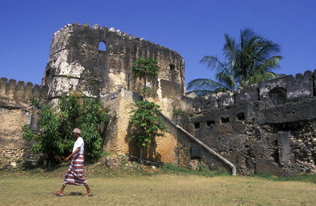 A man in traditional dress at the Old Fort in Stone Town, the capital of Zanzibar island east of Tanzania in the Indian Oceanのeditorial素材