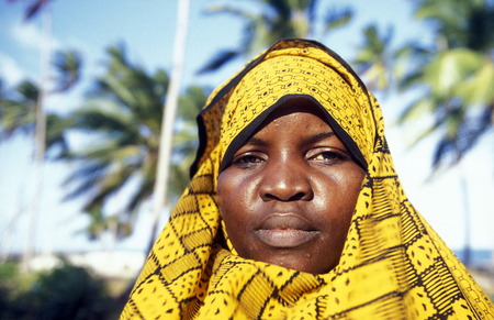 A woman at Bwejuu on the east coast of Zanzibar Island in the Indian Ocean in Tanzania in East Africaのeditorial素材