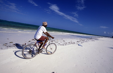 The sandy beach at Bwejuu on the east coast of Zanzibar Island in the Indian Ocean in Tanzania in East Africaのeditorial素材