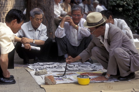 Seniors at Calligraphy font painting in the center in the capital Seoul in South Korea in East Asiaのeditorial素材