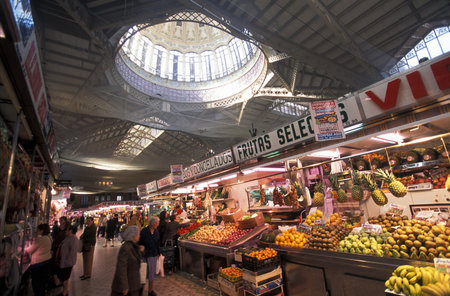 The architecture inside the market hall of the Central Market in the city of Valencia in the duskのeditorial素材
