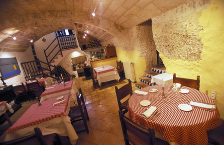 The basement restaurant of the Hotel Leon in the center of the small town Sineu and in the center of the island of Mallorca Balearic Islands one of the islands in the Mediterraneanのeditorial素材