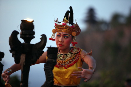 A dancer at a traditional Balinese Tanzauffuehrung in Ubud in Central Bali on the island of Bali in Indonesiaのeditorial素材