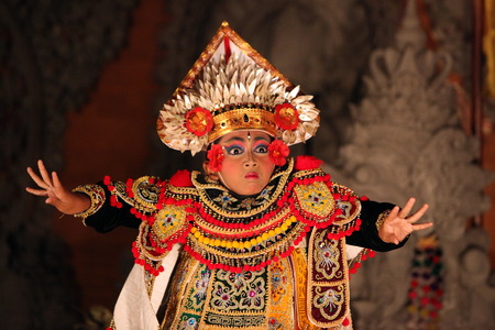 A dancer at a traditional Balinese Tanzauffuehrung in Ubud in Central Bali on the island of Bali in Indonesiaのeditorial素材