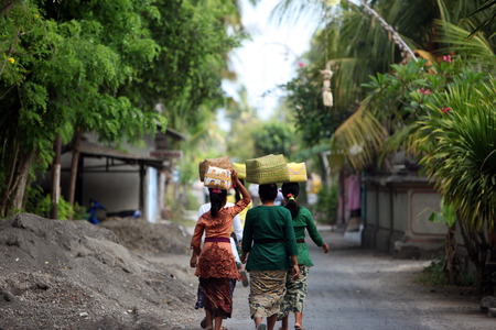 Women after a celebration on the Island nusa Lembongan next to Bali in Indonesiaのeditorial素材