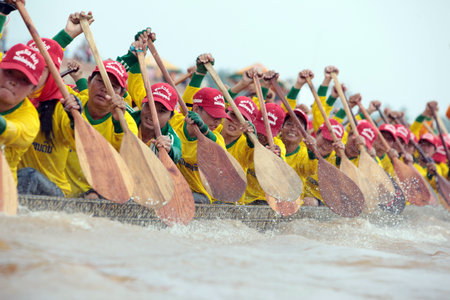 Rowers at the traditional boat races on the Mekong River in Vientiane, capital of Laos in Southeast...