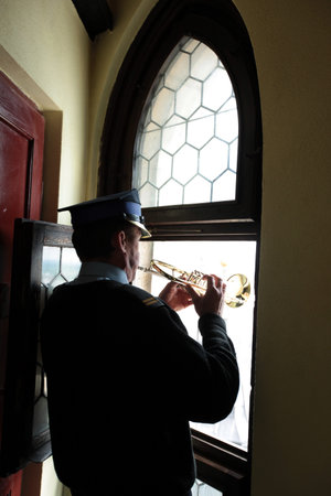 The Turmblaeser with a bugle call from the tower of St. Mary's Church in the Old Town of Krakow...