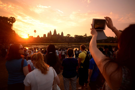 Tourists at the Angkor Wat in the Temple City of Angkor near the City of Siem Riep in the west of...