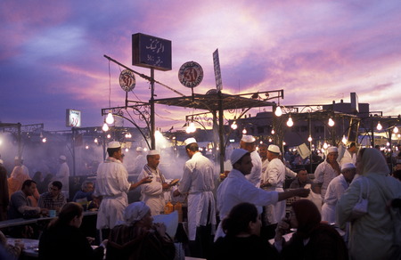 The Streetfood and Nightlife at the Djemma del Fna Square in the old town of Marrakesh in Morocco in North Africa.のeditorial素材