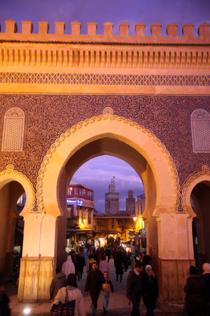 The blue gate at the Bab Bou Jeloud in the old City in the historical town of Fes in Morocco in...