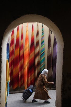 a shop in the Market Road in the medina of old City in the historical town of Fes in Morocco in north Africa.のeditorial素材