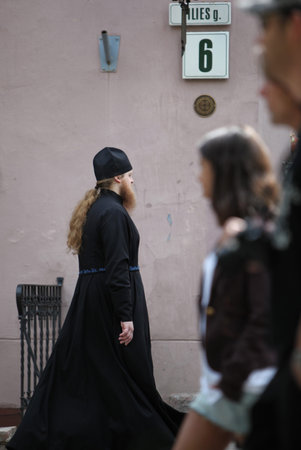 a Monk in the old City of Vilnius in the Baltic State of Lithuania,  